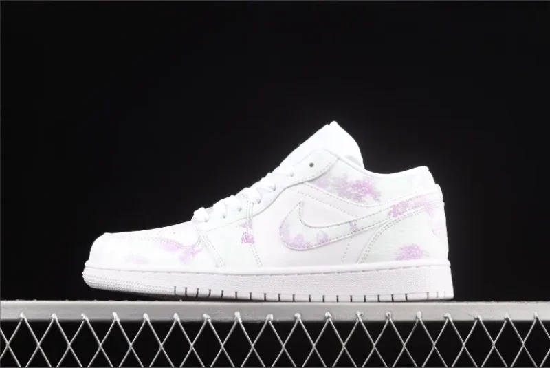 Jordan 1 Low e piel granulada en blanco monocromático