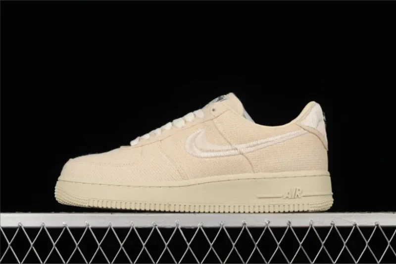 Nike Air Force 1 Low Stussy en gris fósil