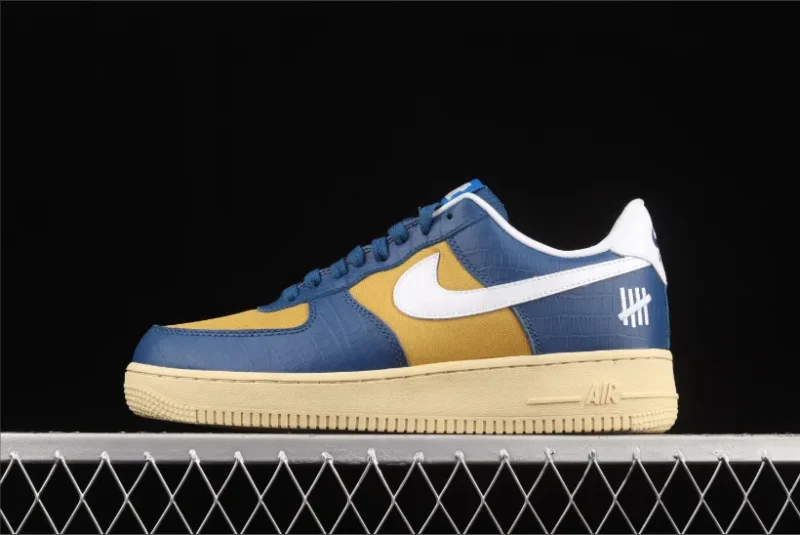 Nike Air Force 1 Low SP Undefeated 5 On It en azul y amarillo con estampado de cocodrilo
