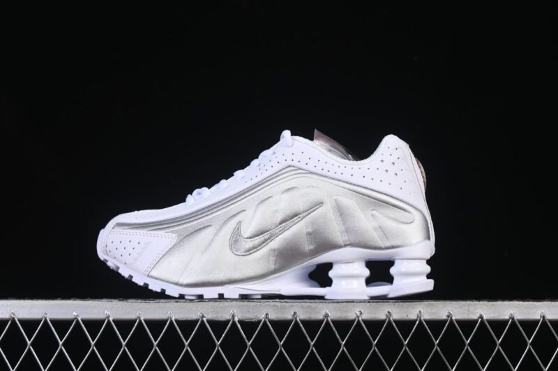 NIKE SHOX IN WHITE AND METALLIC SILVER